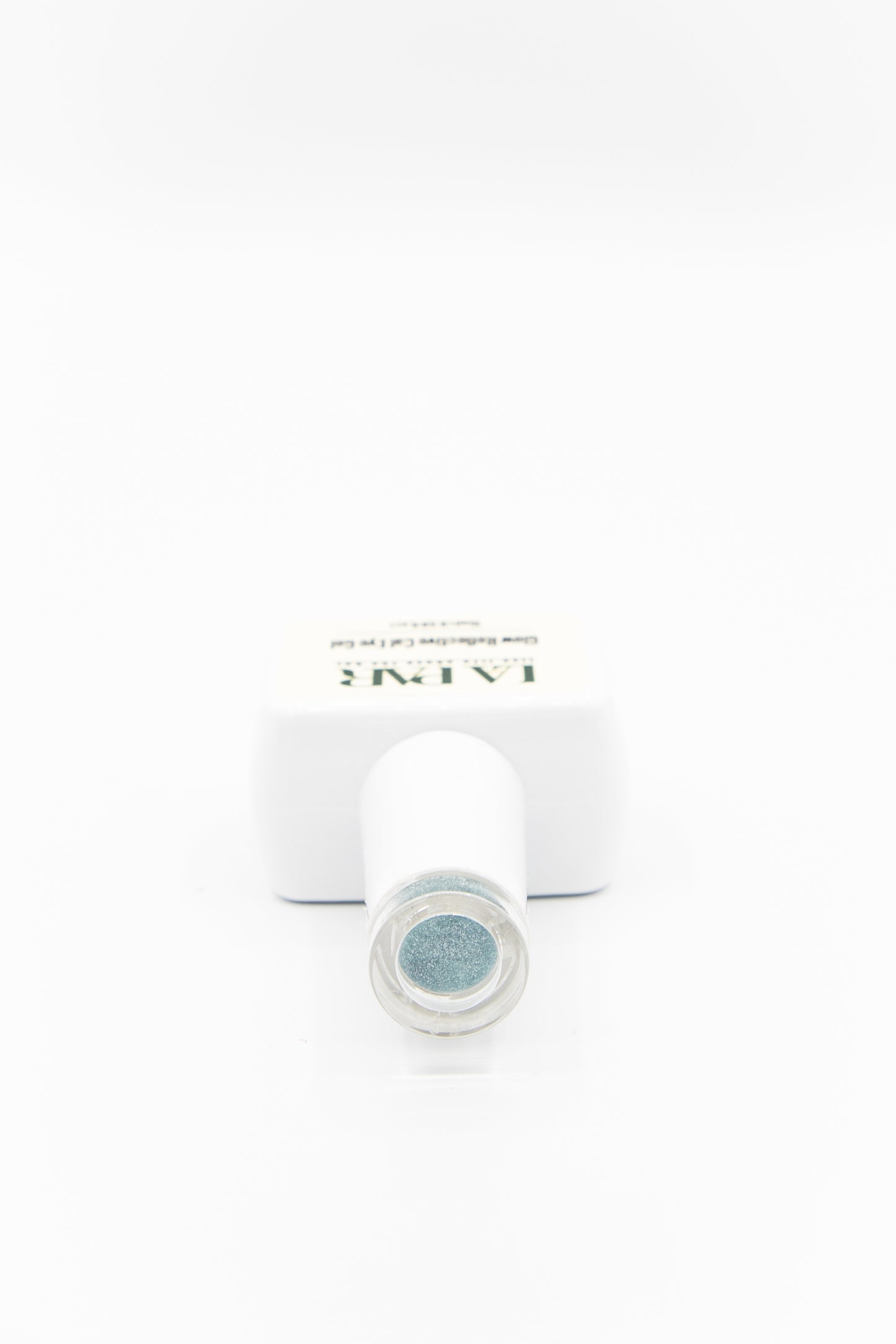 La Par Turquoise #5 Glow Reflective Cat Eye Gel Polish bottle cap