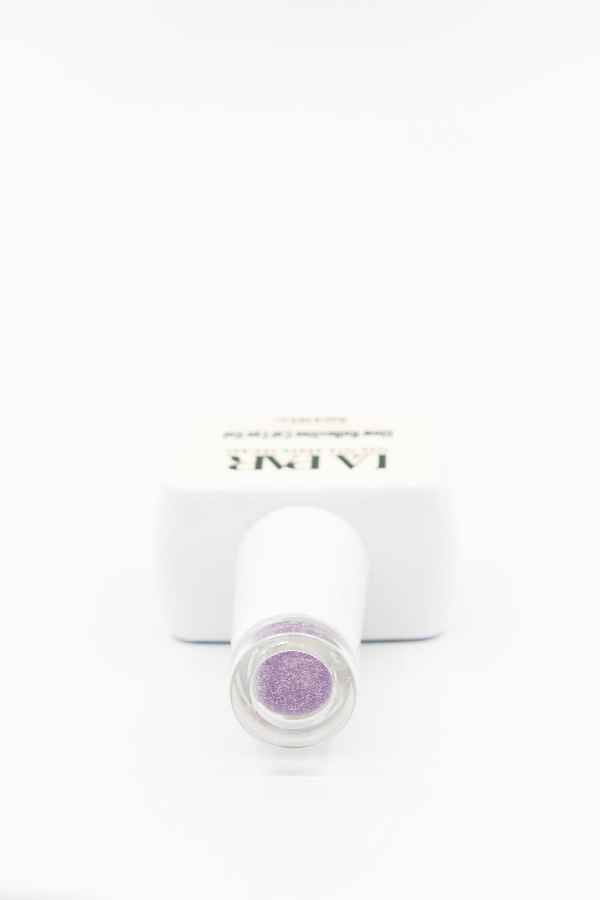 La Par Tanzanite #6 Glow Reflective Cat Eye Gel Polish bottle cap