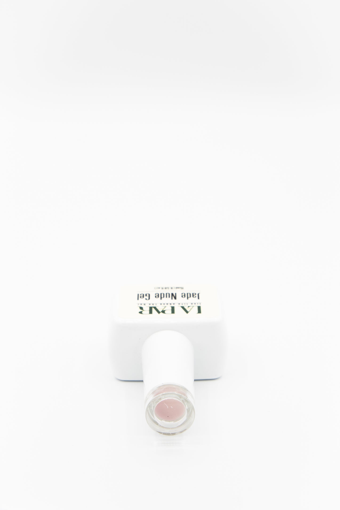 La ParPersephone #83 Jade Nude Gel Polish bottle cap lying down