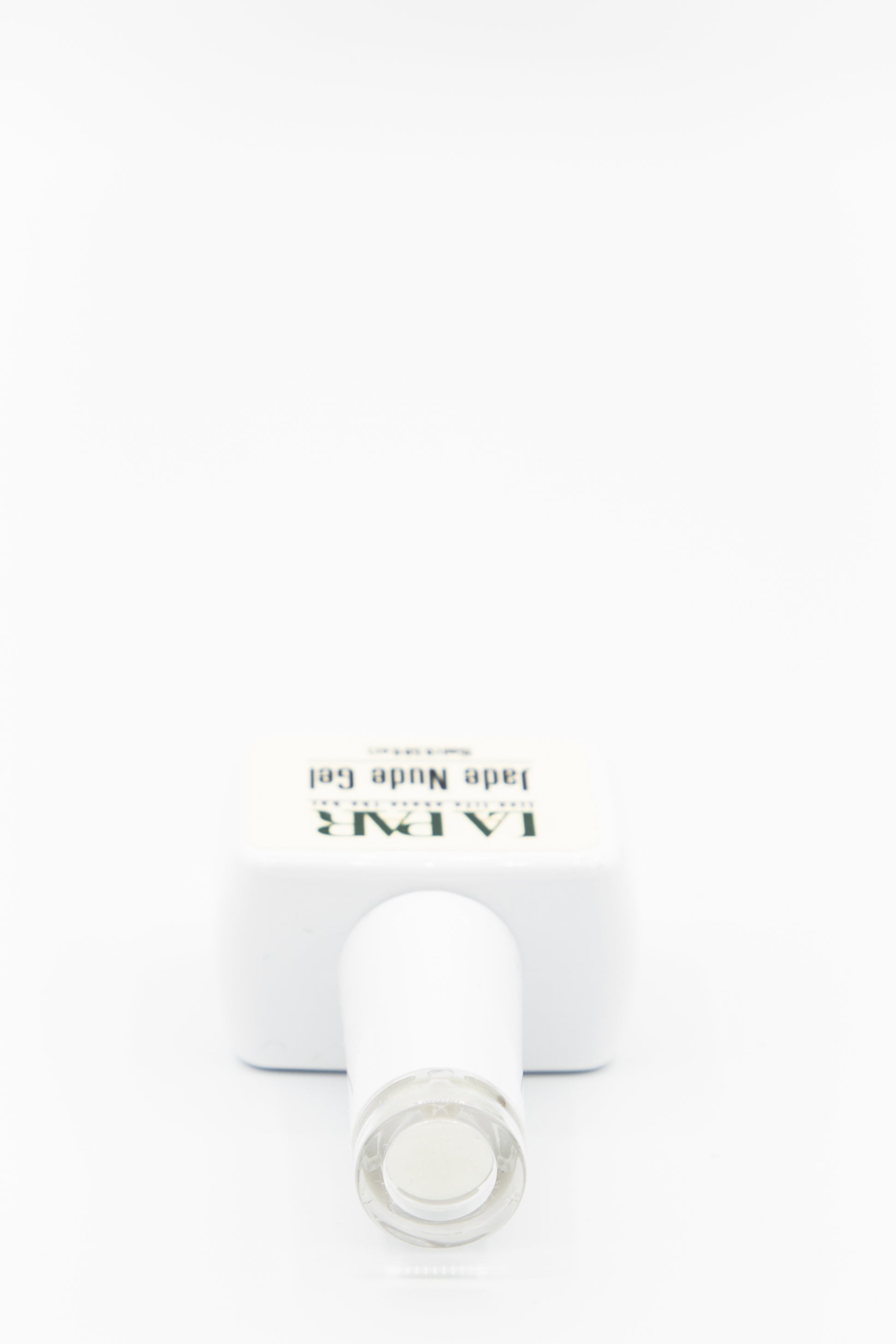 La Par Hestia #84 Jade Nude Gel Polish bottle lying down