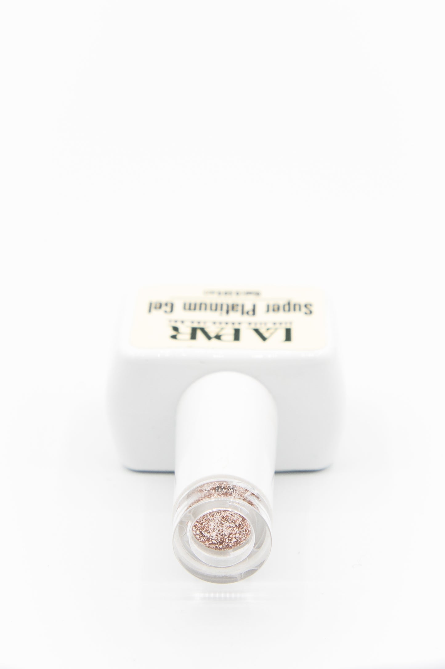 Gold Rush #114 Super Platinum Gel Polish bottle lying down