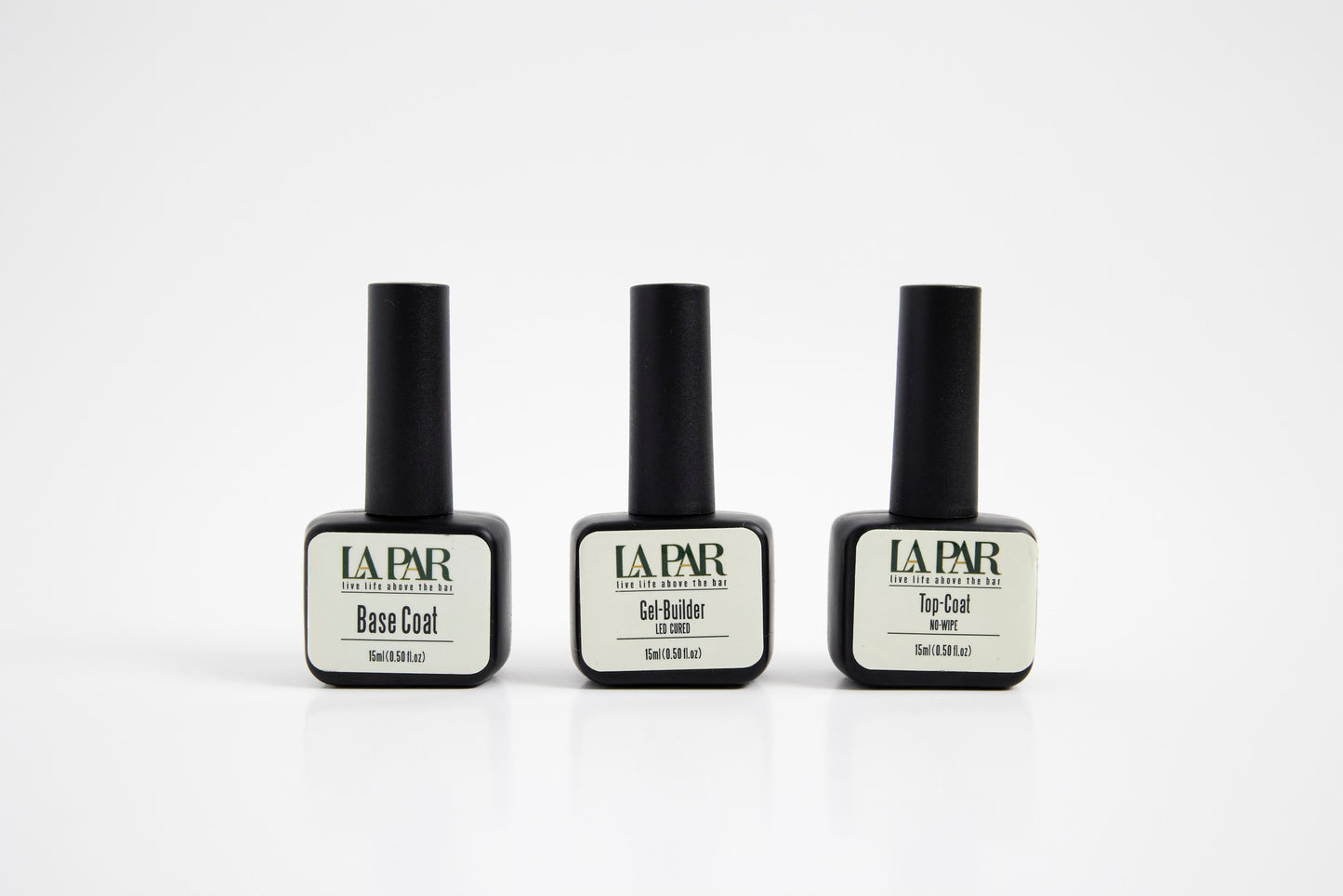 Stand alone bottles of La Par Base Coat, Gel-Builder, and Top-Coat