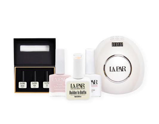 The At Home Kit consisting of Trio Foundation, 2 Builder In Bottles, 3 color match and a LED Lamp